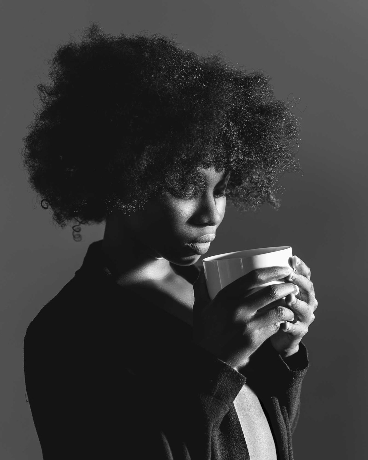 Woman with afro hair.