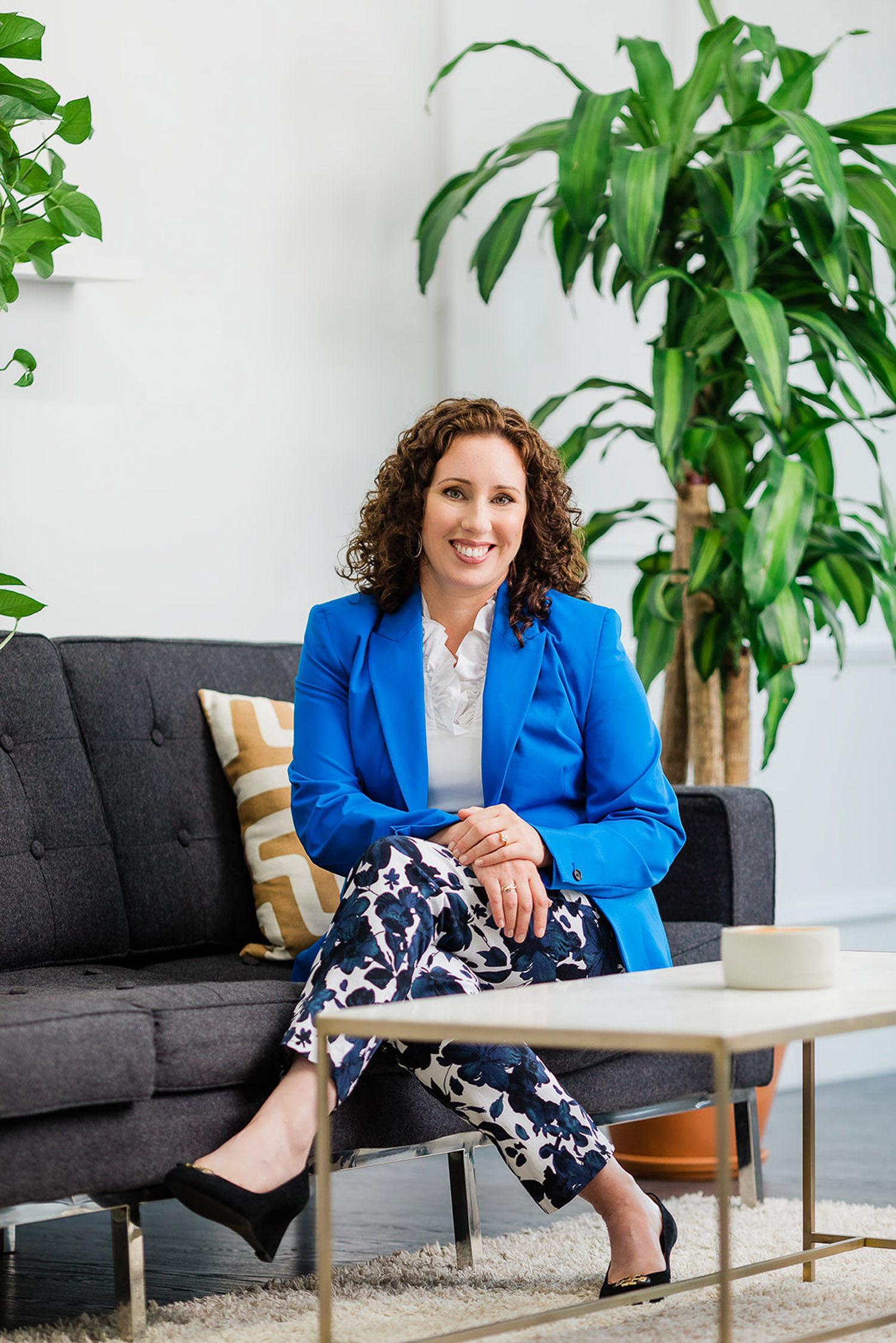 Female entrepreneur wearing bright colours outfit