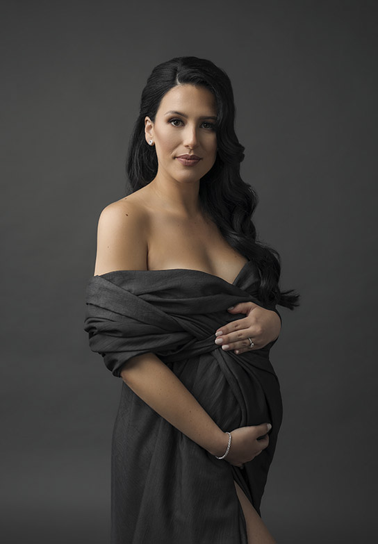 minimalist portrait of a pregnant woman in toronto studio