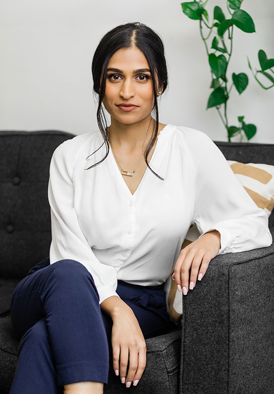 toronto woman entrepreneur sitting on a couch