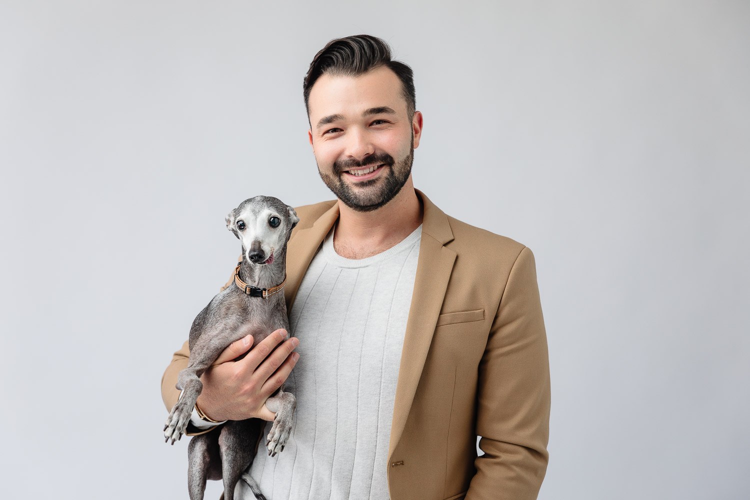 Headshot of a toronto realtor with his dog