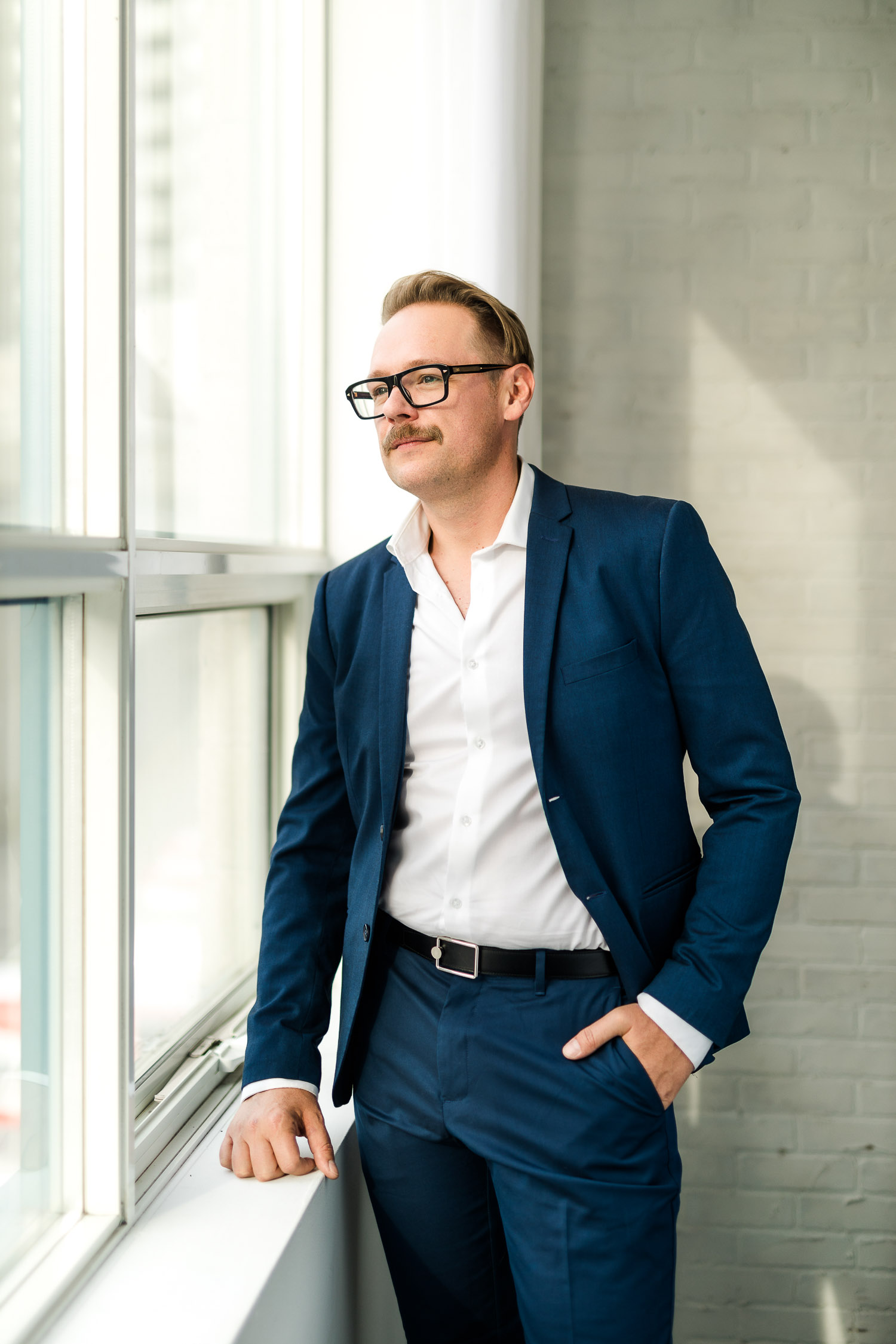 Businessman looking outside of a window