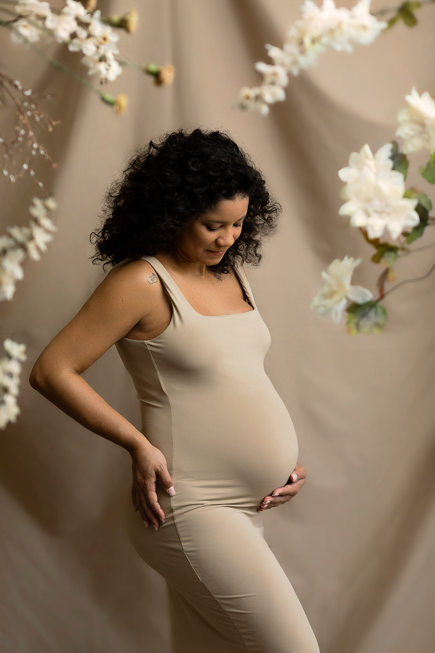 Pregnant woman photographed in studio