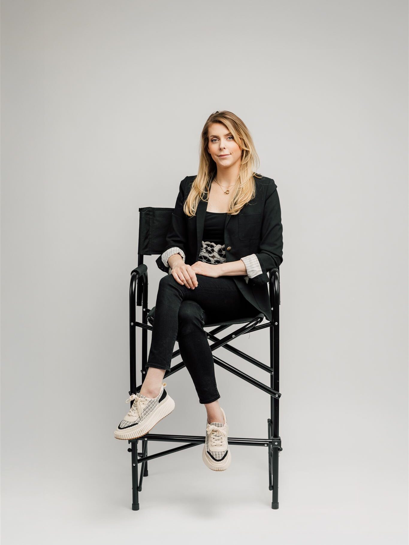 Makeup and Hair Stylist sitting on a makeup chair